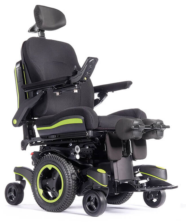 The Q700-UP standing wheelchair with bright green accents shown from the front at an angle