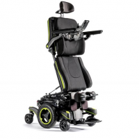 The Q700-UP standing wheelchair in the standing position with bright green trim thumbnail