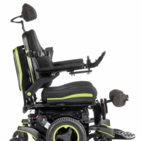 The Q700-UP standing wheelchair with bright green accents, shown from the right side thumbnail