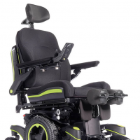 The Q700-UP standing wheelchair with bright green accents shown from the front at an angle thumbnail